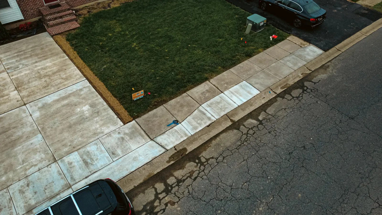 Aerial view of a finished concrete driveway and apron in New Castle County, DE