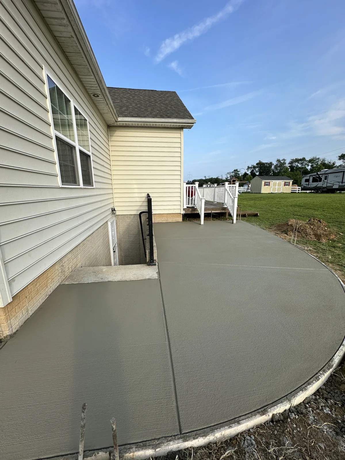 Large finished concrete patio in a New Castle County, DE backyard