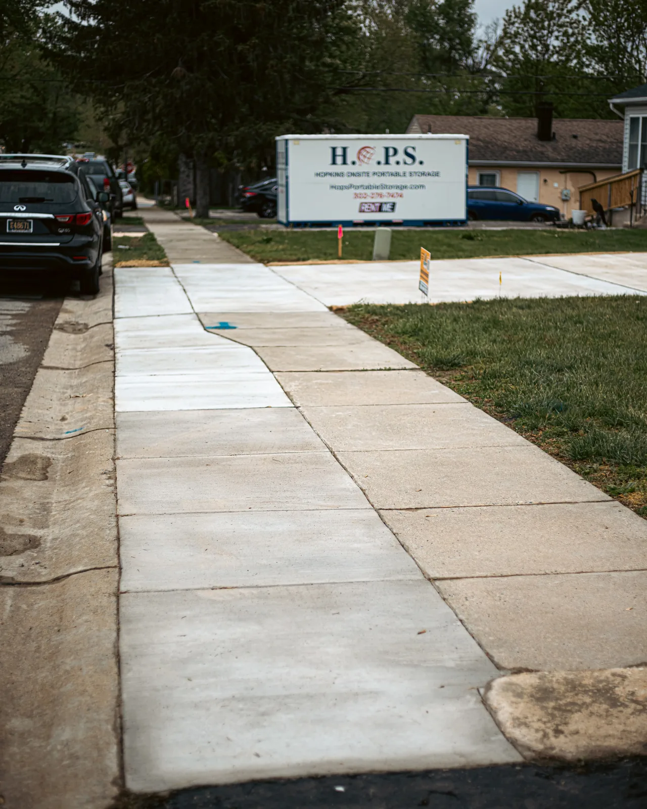 Finished concrete sidewalk and walkway at a New Castle County, DE property