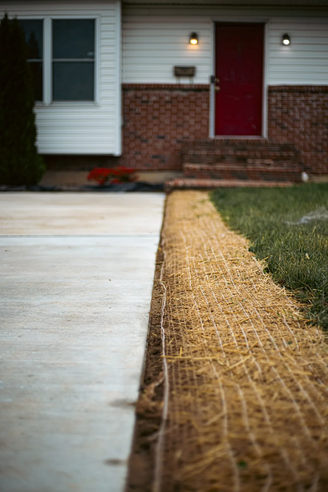 Textured concrete walkway leading to a front entry in New Castle County, DE