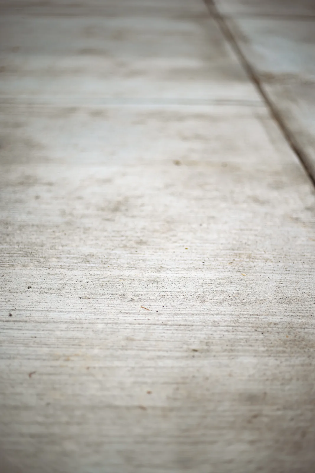 Close-up of broom-finished concrete surface texture in New Castle County, DE