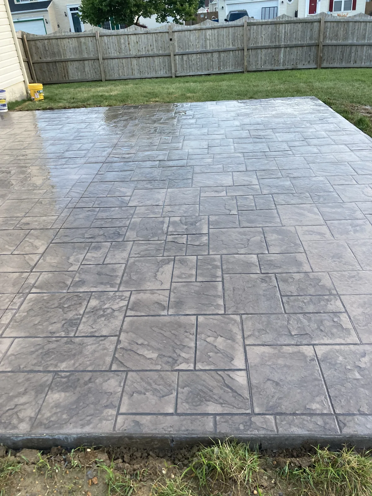 Dark stamped concrete driveway in New Castle County, DE