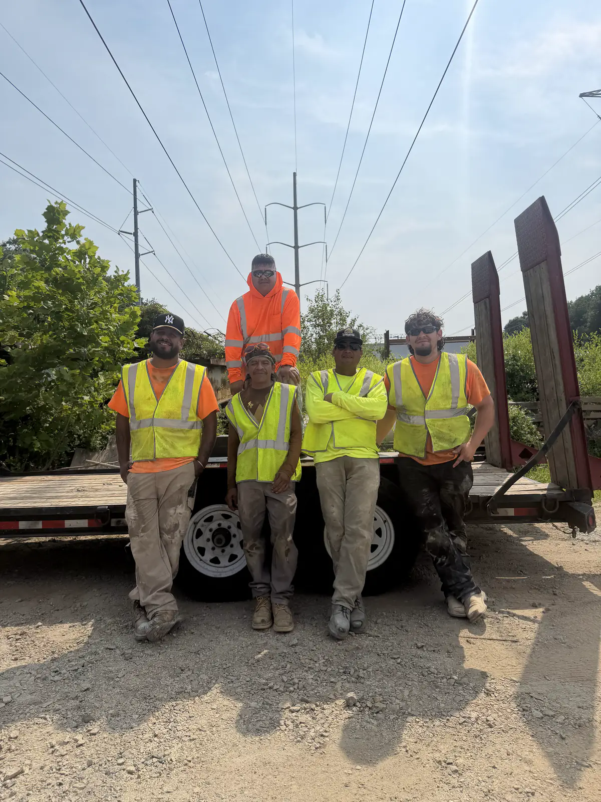 Tri-County Construction crew in hi-vis vests at a New Castle County, DE public works jobsite